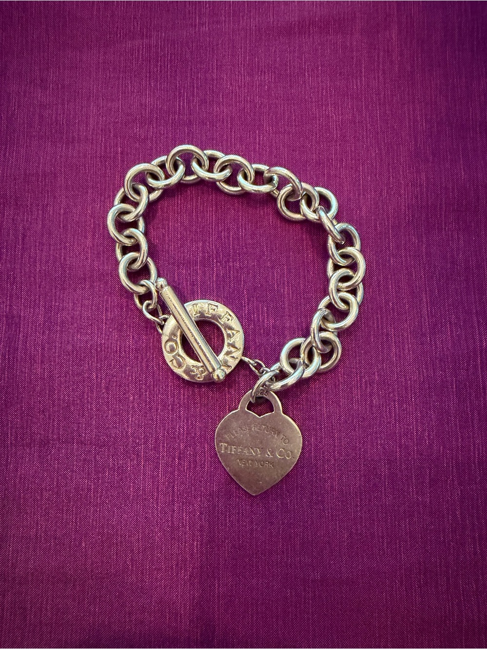 Tiffany & Co. Sterling Silver Heart Tag Toggle Bracelet in Silver on Purple